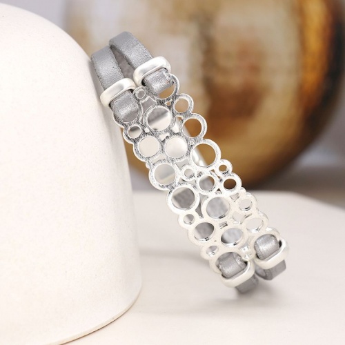 Double strand silver/grey leather and silver multi-circle bracelet by Peace of Mind